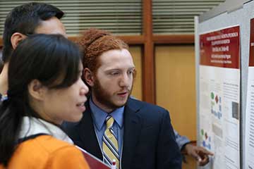 An IUPUI student presenting his capstone project.