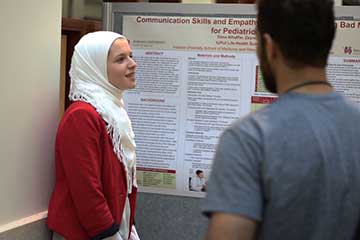 An IUPUI student presenting her capstone project.